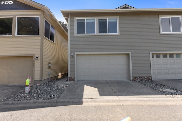 29027 Vizcaino Ct, Gold Beach, OR 97444 - view of front of property with a garage and driveway