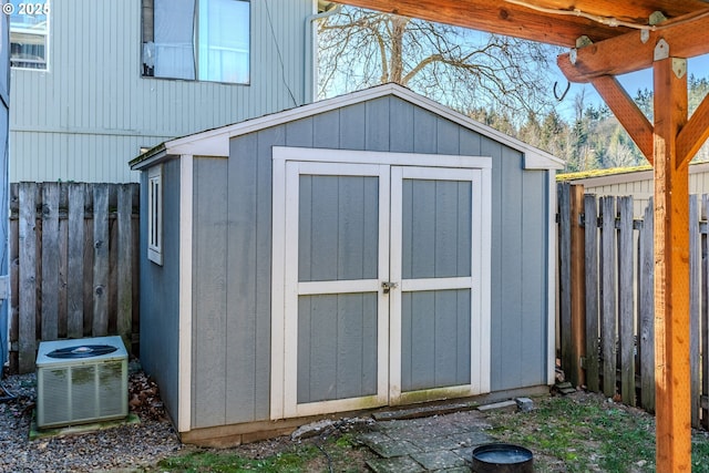 view of outdoor structure featuring central AC