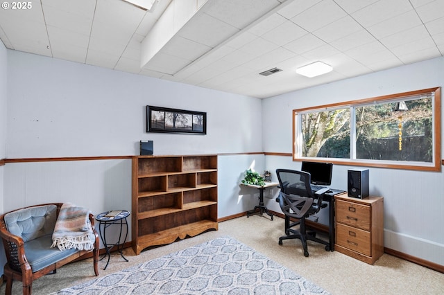 office area featuring light carpet