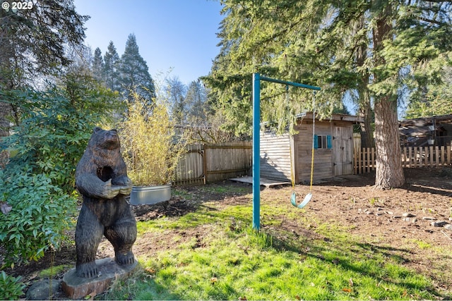 view of yard featuring a storage unit