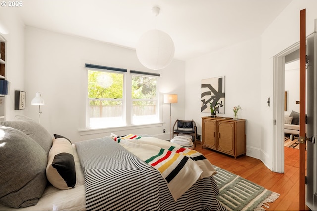 bedroom featuring wood finished floors