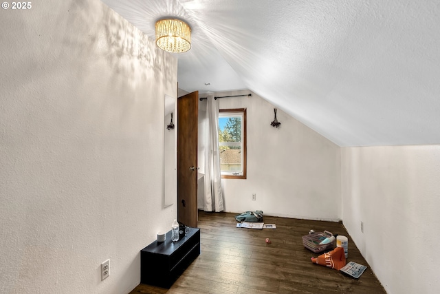 12107 SE Carlton St, Portland, OR 97266 - additional living space with lofted ceiling, a textured ceiling, a chandelier, and wood-type flooring