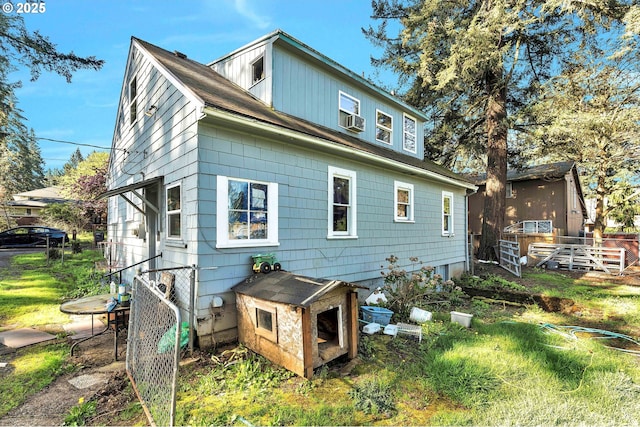 12107 SE Carlton St, Portland, OR 97266 - rear view of property with fence and cooling unit
