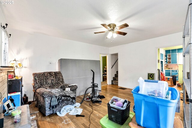 12107 SE Carlton St, Portland, OR 97266 - interior space featuring stairway, ceiling fan, and wood finished floors