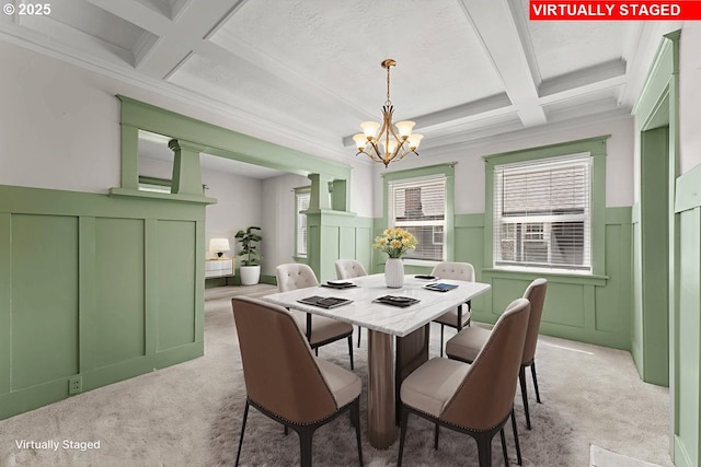 4529 SE 44th Ave, Portland, OR 97206 - dining space with coffered ceiling, a decorative wall, beamed ceiling, light colored carpet, and a chandelier