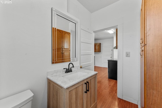 4529 SE 44th Ave, Portland, OR 97206 - half bathroom featuring wood finished floors and vanity