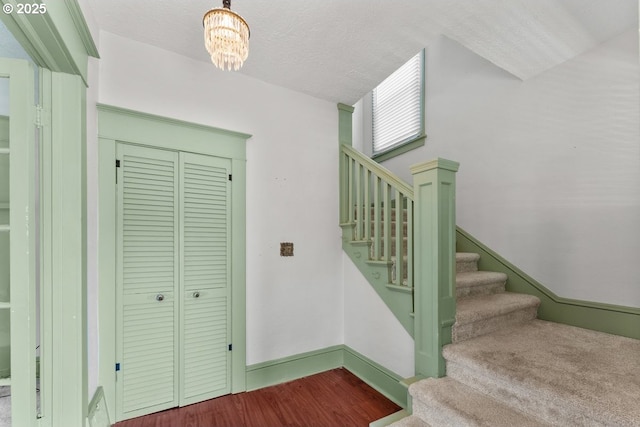 4529 SE 44th Ave, Portland, OR 97206 - staircase with a chandelier and wood finished floors