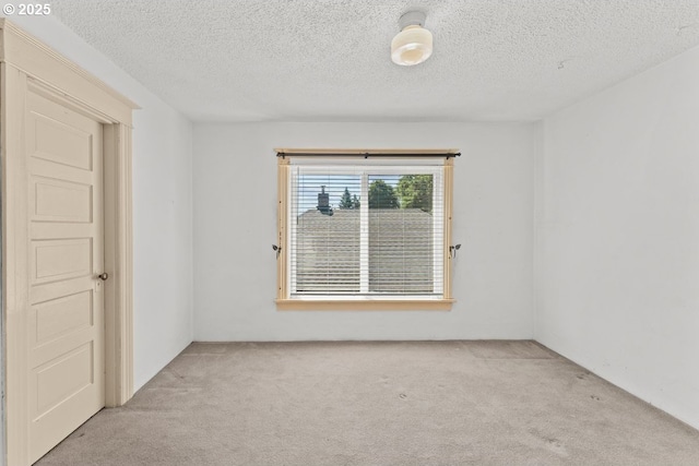 4529 SE 44th Ave, Portland, OR 97206 - unfurnished room with carpet and a textured ceiling