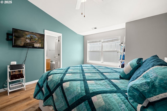 14640 SW Redbud Way, Beaverton, OR 97007 - bedroom with lofted ceiling, wood finished floors, connected bathroom, and ceiling fan