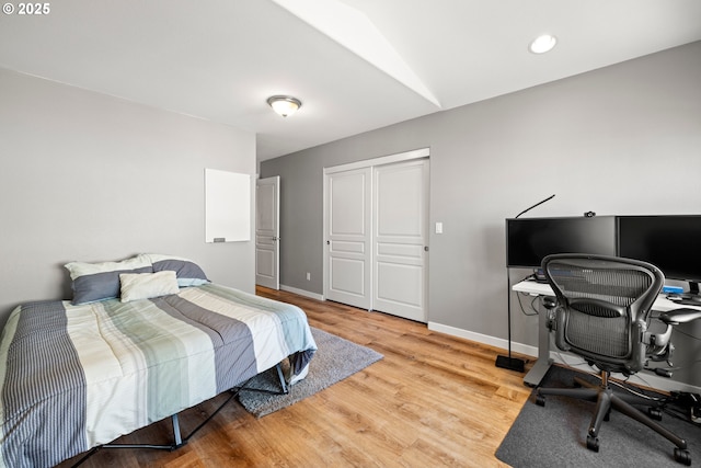 14640 SW Redbud Way, Beaverton, OR 97007 - bedroom featuring an office area, wood finished floors, and a closet