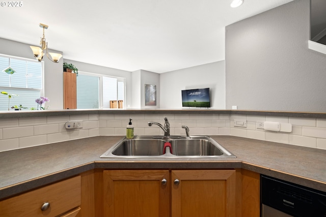 14640 SW Redbud Way, Beaverton, OR 97007 - kitchen with dishwasher, backsplash, dark countertops, and brown cabinetry
