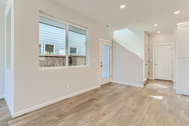 31709 NW Turel Dr, North Plains, OR 97133 - foyer featuring recessed lighting, light wood-type flooring, baseboards, and stairs