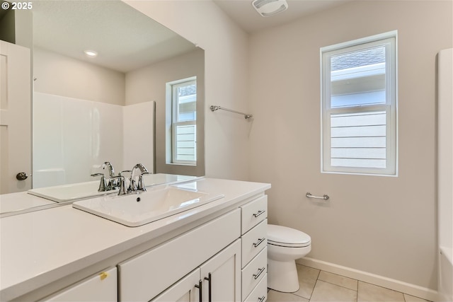 31709 NW Turel Dr, North Plains, OR 97133 - bathroom with tile patterned floors, baseboards, toilet, and vanity