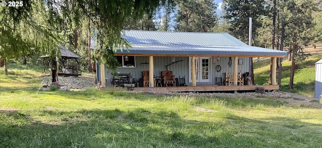 39798 Bear Gulch Rd, Sumpter, OR 97877 - back of property featuring a metal roof and board and batten siding