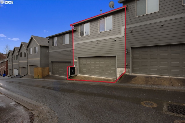 exterior space featuring an attached garage