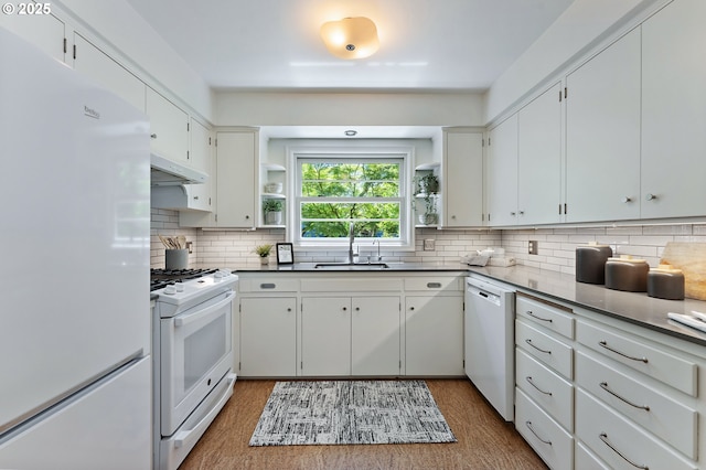 3575 NE Emerson St, Portland, OR 97211 - kitchen with white appliances, under cabinet range hood, open shelves, a sink, and wood finished floors