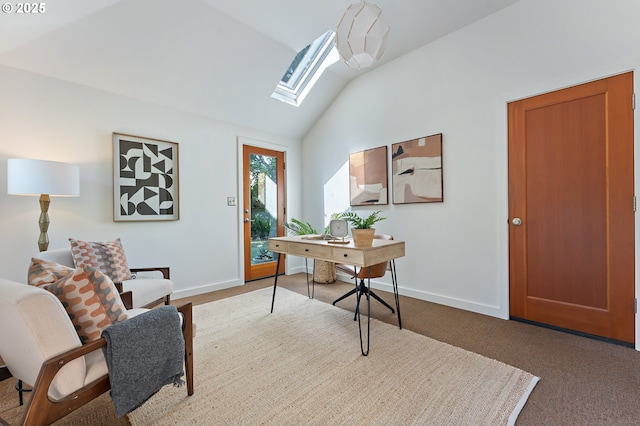 3575 NE Emerson St, Portland, OR 97211 - home office with a skylight, carpet, vaulted ceiling, and baseboards