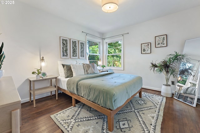 3575 NE Emerson St, Portland, OR 97211 - bedroom with baseboards and dark wood-style flooring