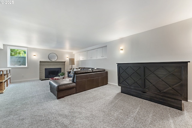 3575 NE Emerson St, Portland, OR 97211 - living area featuring carpet flooring, baseboards, and a fireplace
