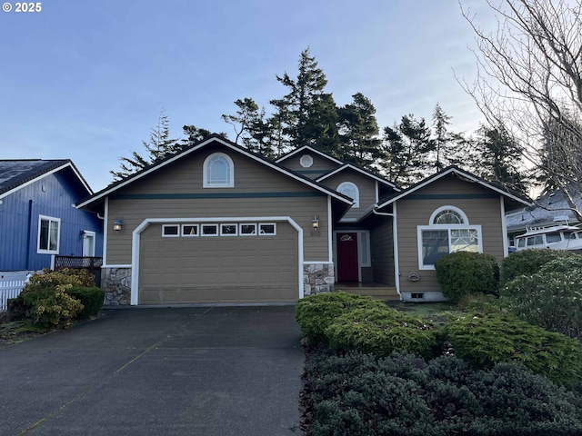 view of front of property with a garage