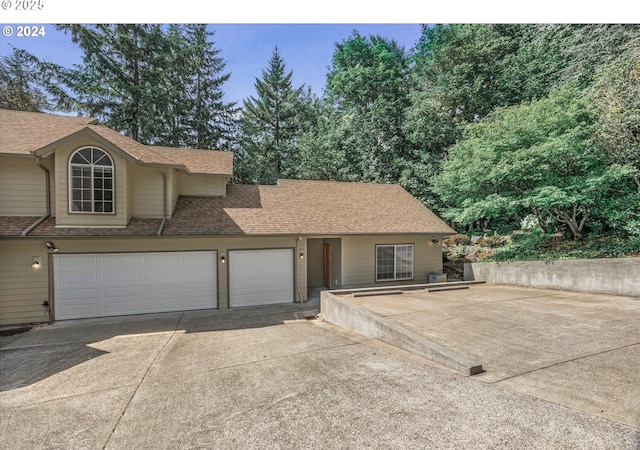 view of front of home with a garage