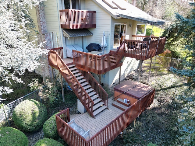 deck with a hot tub