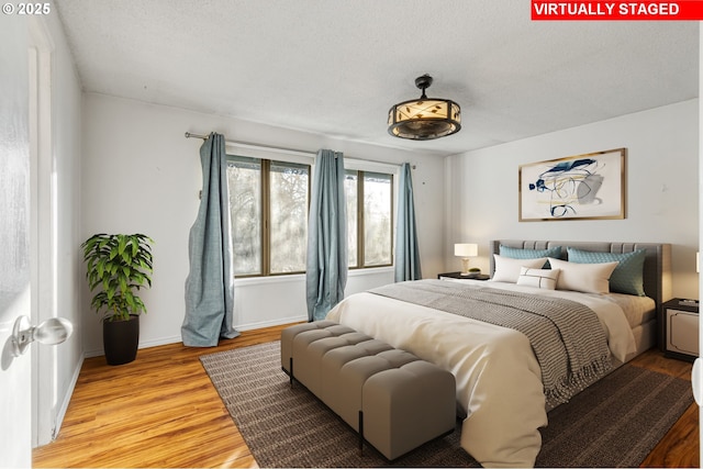 bedroom featuring light hardwood / wood-style floors