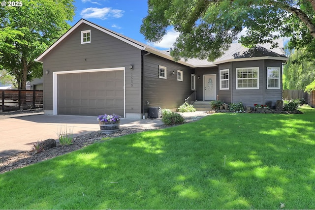 1555 W 13th Ave, Junction City, OR 97448 - ranch-style home featuring concrete driveway and a garage