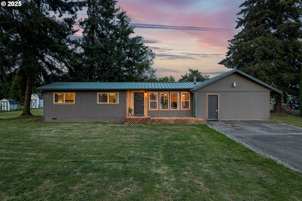 200 Roberson Rd, Woodland, WA 98674 - ranch-style home with driveway, a yard, and a shed