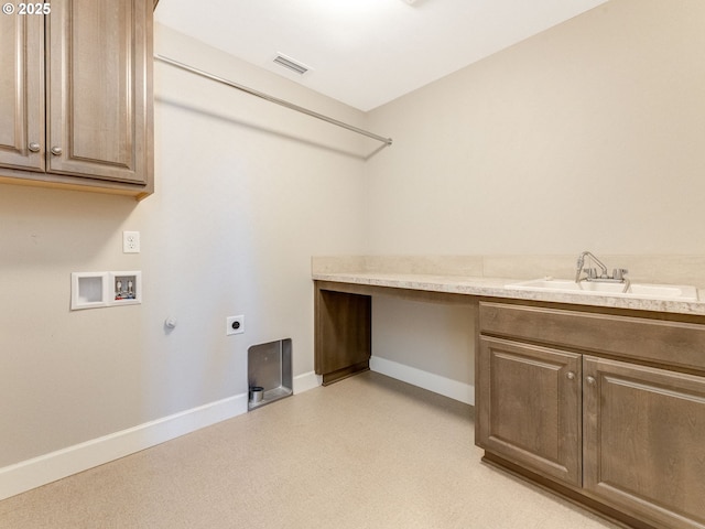 washroom featuring cabinets, sink, hookup for an electric dryer, and hookup for a washing machine