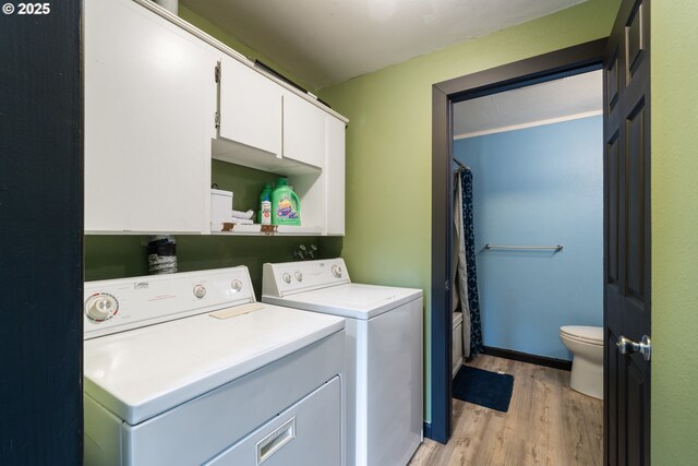 567 NW Cedar Ct, Warrenton, OR 97146 - washroom featuring washing machine and dryer and light wood-type flooring