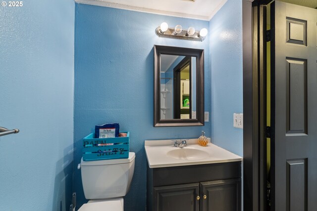 567 NW Cedar Ct, Warrenton, OR 97146 - bathroom with vanity and toilet