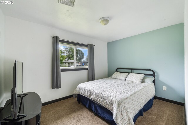 567 NW Cedar Ct, Warrenton, OR 97146 - carpeted bedroom featuring baseboards
