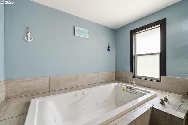 567 NW Cedar Ct, Warrenton, OR 97146 - full bathroom with a jetted tub and a textured wall