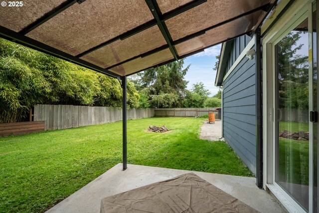 567 NW Cedar Ct, Warrenton, OR 97146 - fenced backyard with a patio