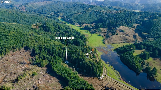 bird's eye view featuring a water and mountain view