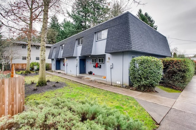 8102 SW 31st Ave, Portland, OR 97219 - view of front of house featuring a shingled roof and mansard roof