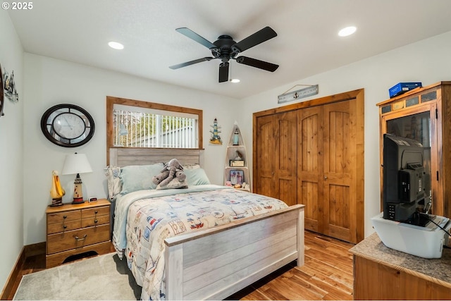 bedroom with light wood-style flooring, recessed lighting, and baseboards