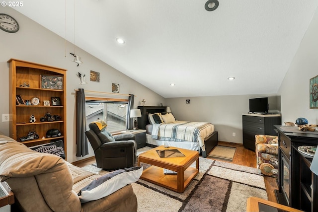 7655 Elliott St, Bay City, OR 97107 - bedroom featuring light wood-style floors, baseboards, and vaulted ceiling