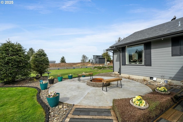 7655 Elliott St, Bay City, OR 97107 - view of patio / terrace with a fire pit