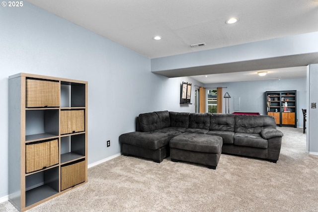 carpeted living room with baseboards, recessed lighting, and visible vents