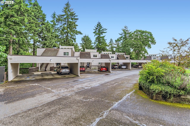 7573 N Edgewater Ave, Portland, OR 97203 - view of front of house featuring covered parking