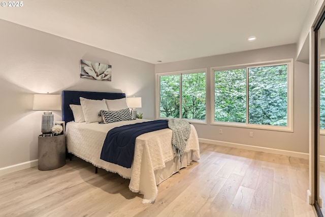 7573 N Edgewater Ave, Portland, OR 97203 - bedroom featuring baseboards, light wood-type flooring, and recessed lighting