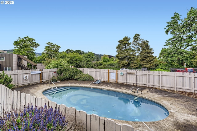 7573 N Edgewater Ave, Portland, OR 97203 - community pool featuring a fenced backyard