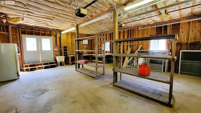 48495 Mcfarland Rd, Oakridge, OR 97463 - basement with freestanding refrigerator and plenty of natural light