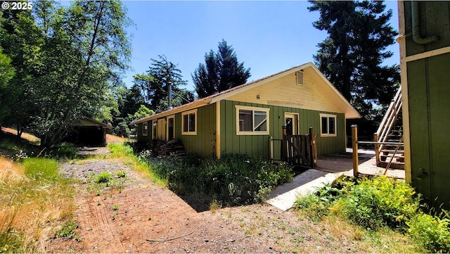 48495 Mcfarland Rd, Oakridge, OR 97463 - view of front of house with a deck and stairway