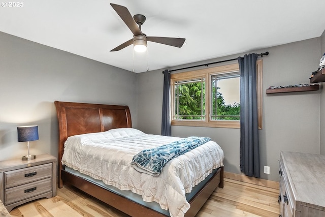 24601 SW 65th Ave, Tualatin, OR 97062 - bedroom featuring light wood-style floors, ceiling fan, and baseboards