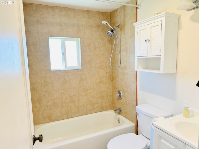 full bath with vanity,  shower combination, and toilet