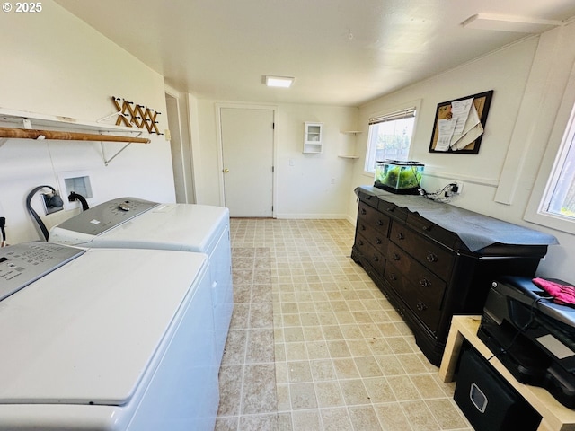 laundry area with separate washer and dryer and laundry area