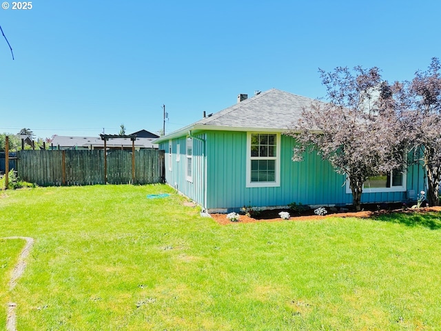 view of yard featuring fence